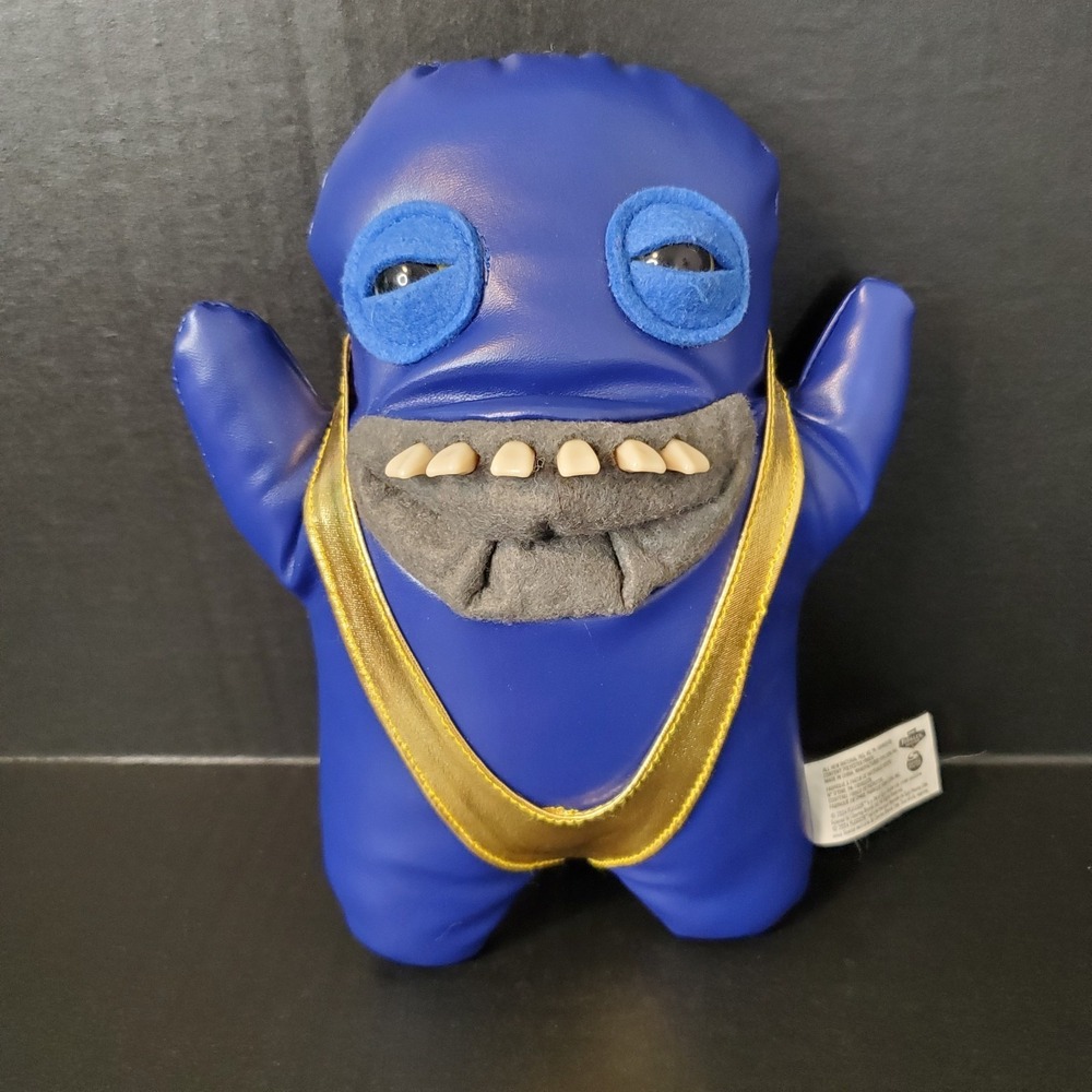 FUGGLER Blue Vinyl Ugly Monster Gold Edition 2024 Wearing One Piece Thong